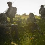 Pictured are members of the Grenadier Guards taking a break during Exercise Noble Jump 17. A joint Air Assault exercise with the American 1st Battalion, 3 Aviation Regiment, 12 Combat Aviation Brigade. The troops practised joint operations and interoperability. Exercise Noble Jump 17 is a logistical challenge that tests the ability of all the participants to deliver a fighting force to wherever it is needed. All movements were controlled by NATO's Multi-National Division South East HQ, based in Bucharest. The VJTF is kept on short notice to move and is able to deploy a powerful well-trained force within days. This year, it is being led by the UK's 20 Armoured Brigade. Overseeing the VJTFs training at Cincu was a combination of Joint Force Command Naples, Multi-National division South East and the Allied Rapid Reaction Corps.