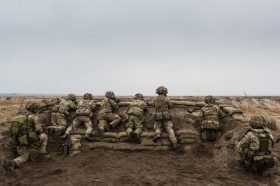 soldiers looking over a range