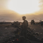 US Soldiers in the dawn sun. Can we trace the failure in afghanistan back to president Nixon.