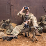 Battlegroup: A soldiers from 2 Rifles mortar platoon takes a drink after a live fire serial on Exercise Askari Storm, Kenya.